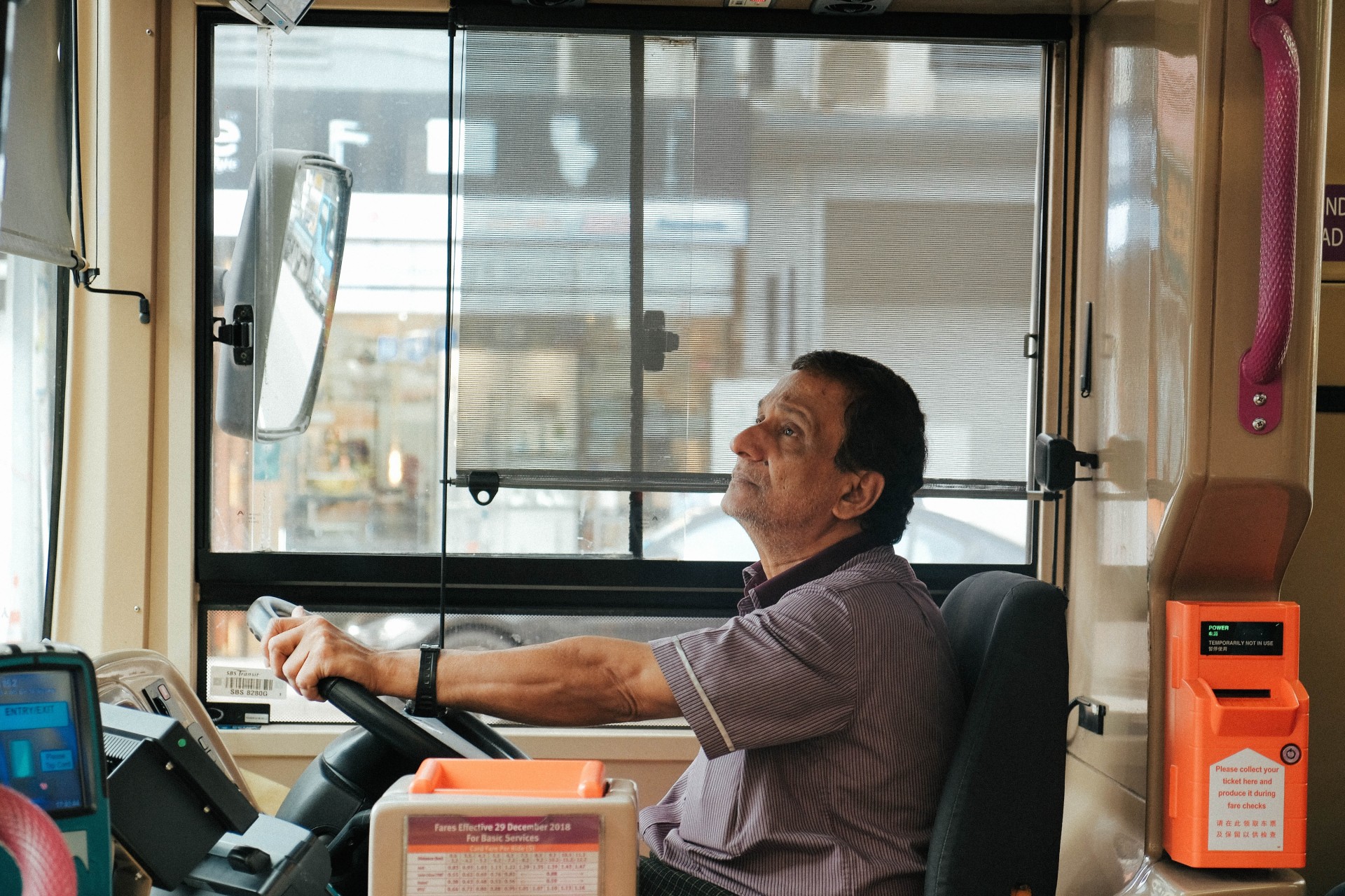 Bus driver behind the wheel