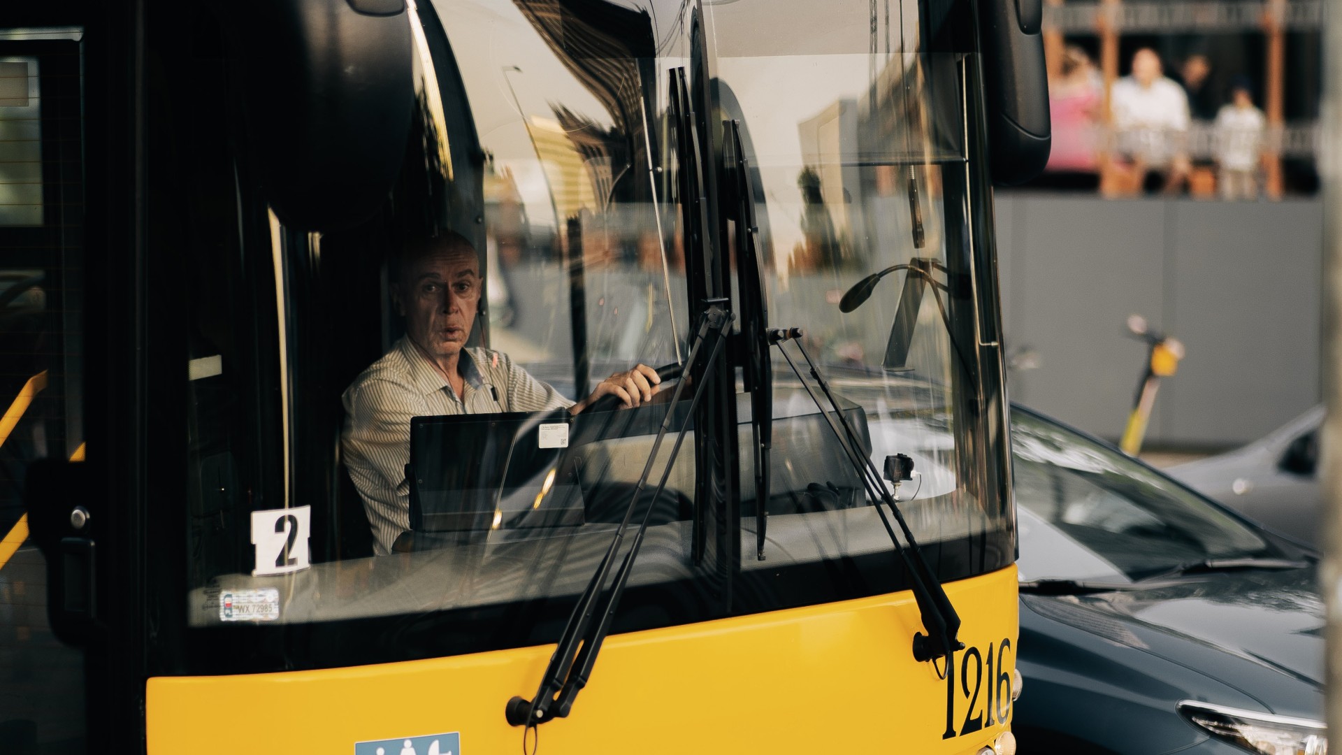 bus driver behind the wheel