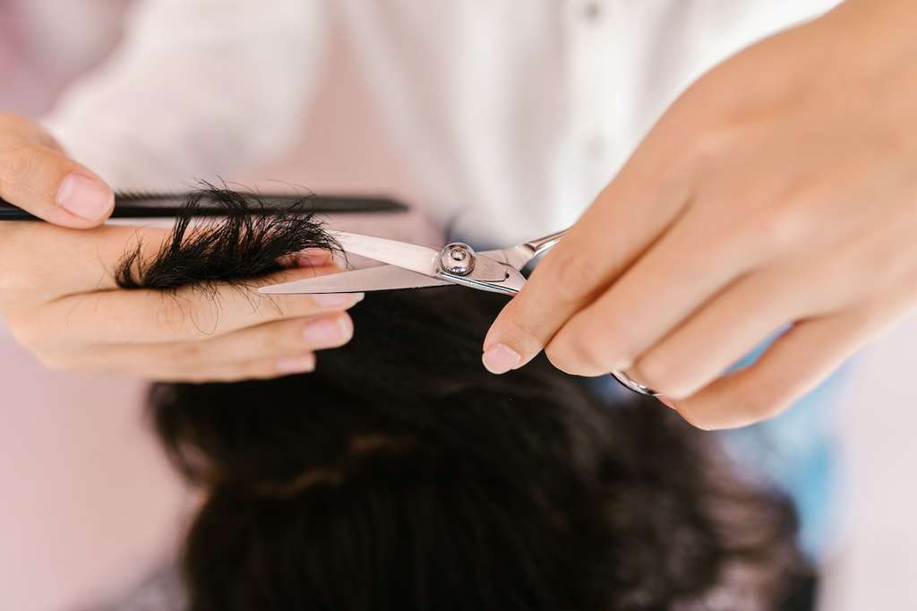 Person getting a hair follicle drug test