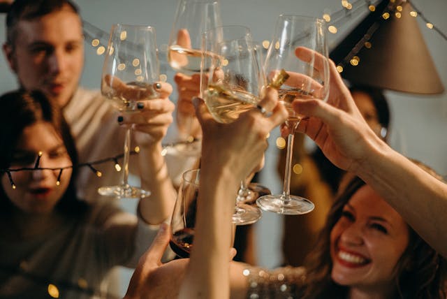 Friends drinking wine at a party