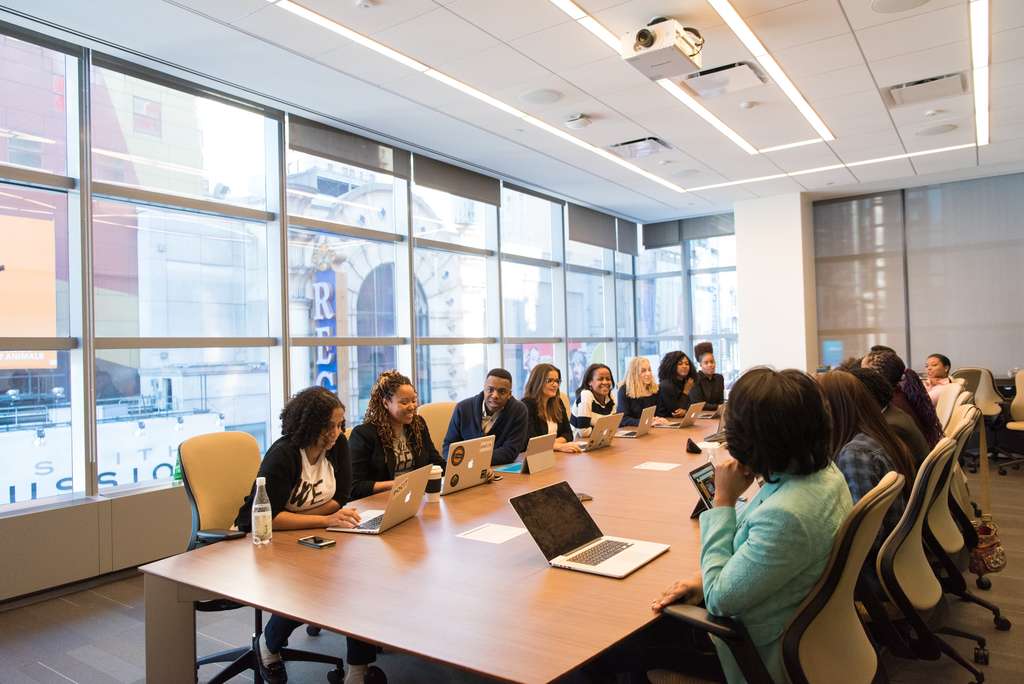 people sitting in a conference room