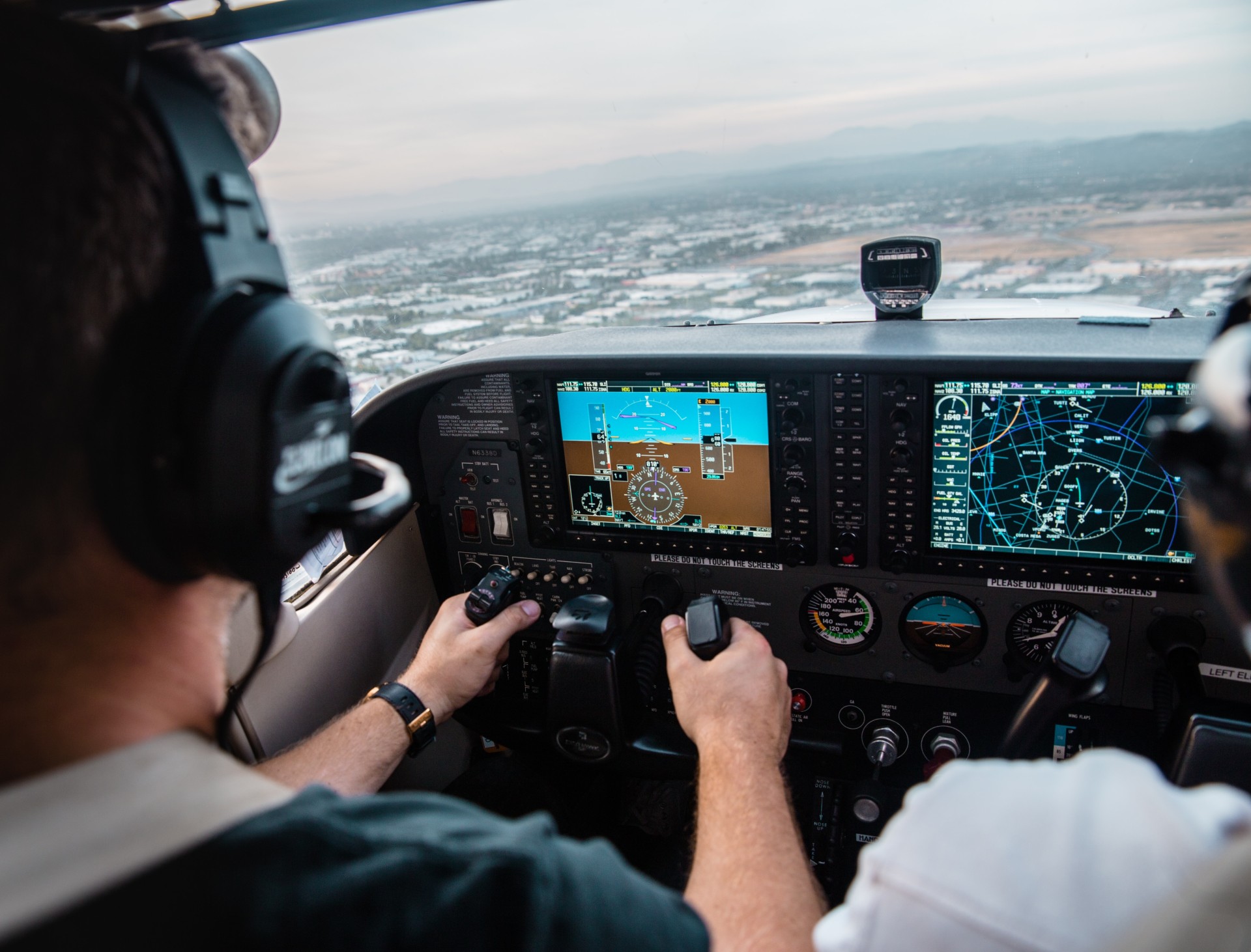 pilot in airplane cockpit