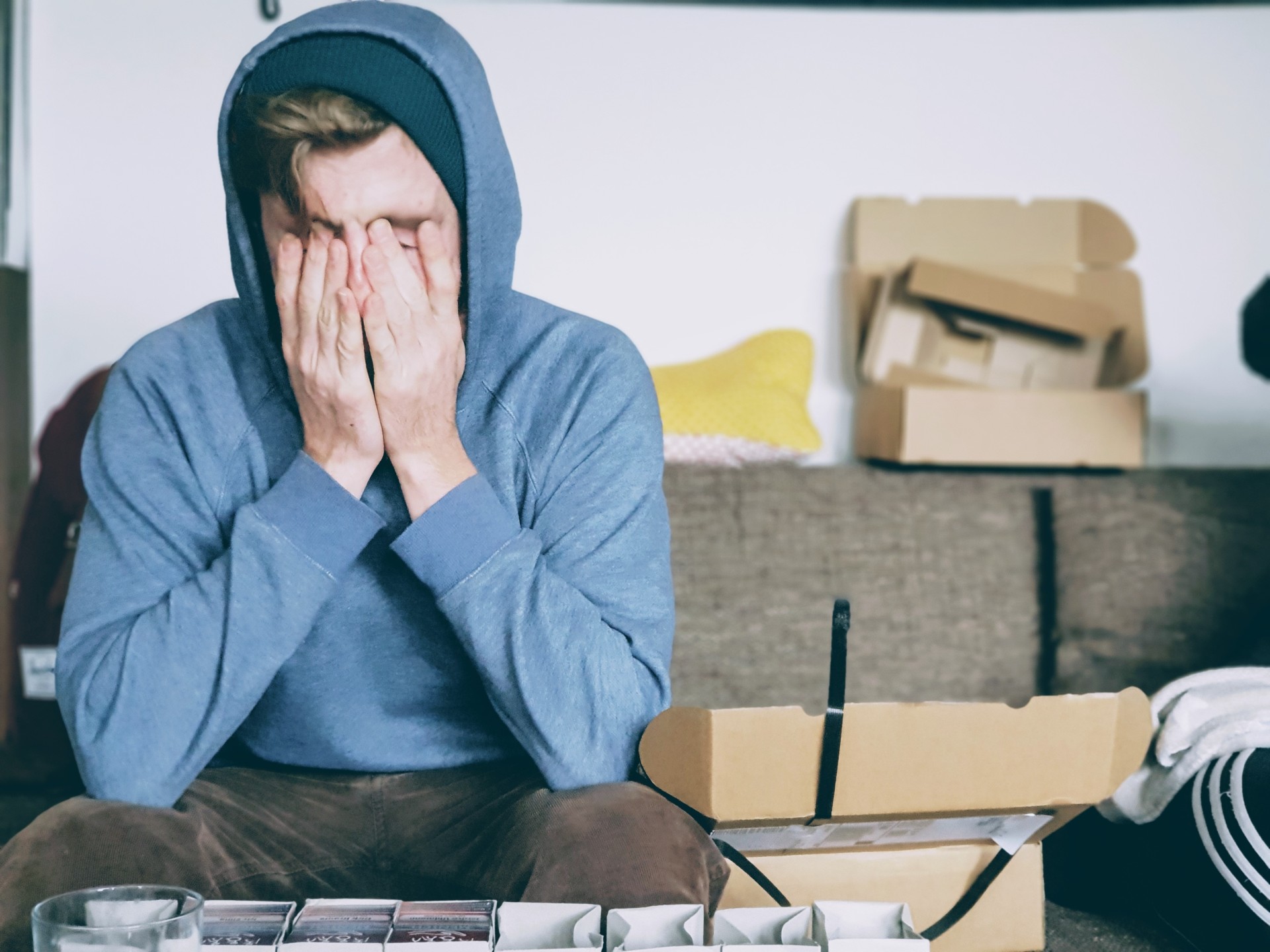 Man rubbing his eyes with his hands