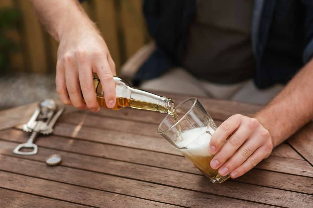 Man pouring a beer