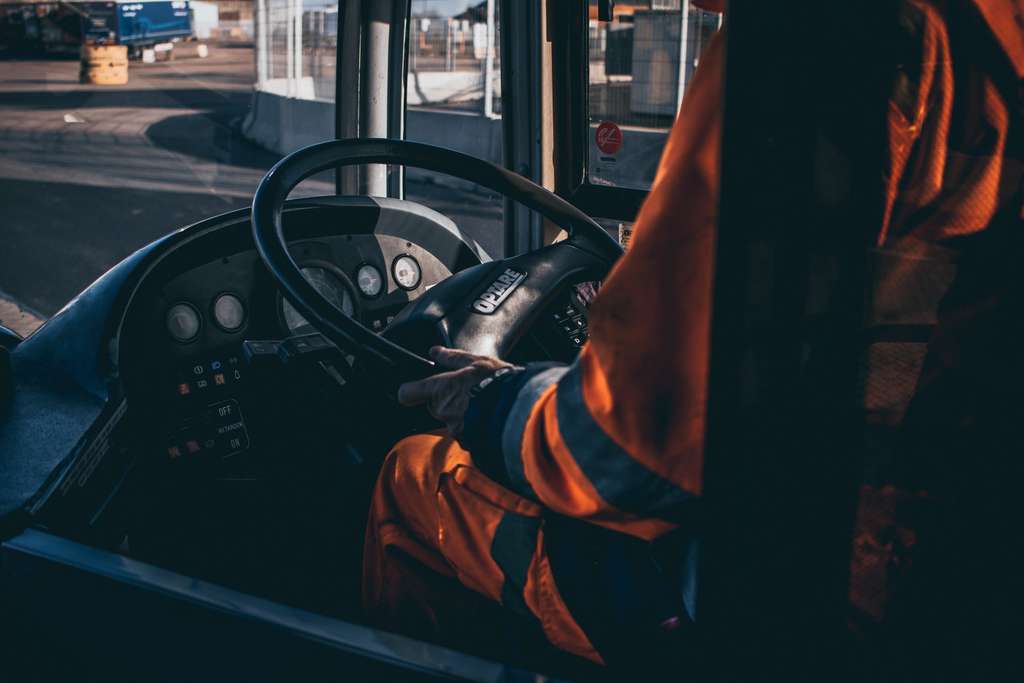 truck driver at steering wheel