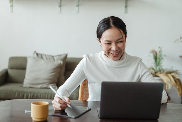 Woman working from home on her laptop