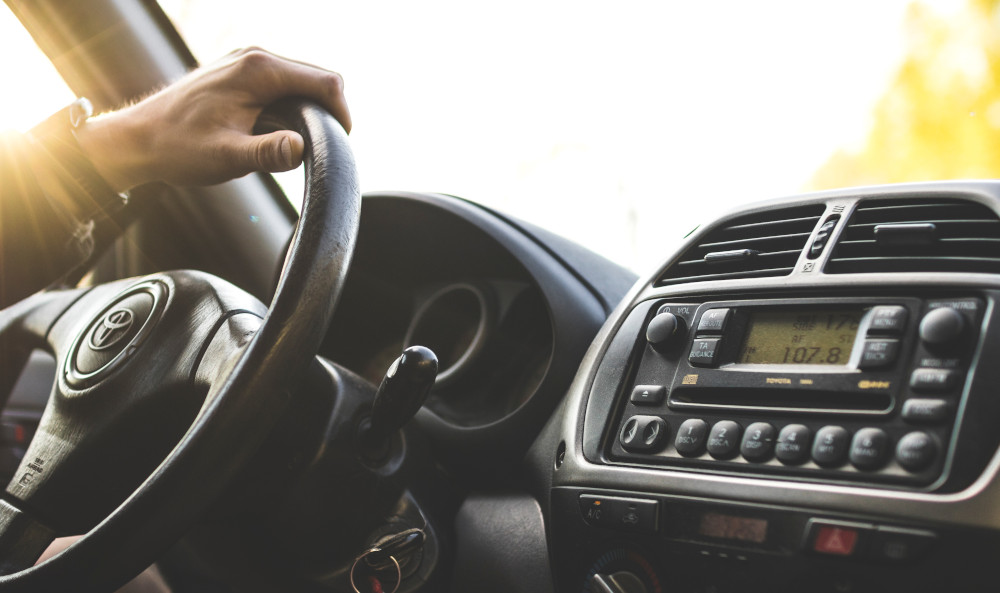 Drug testing collector behind the wheel