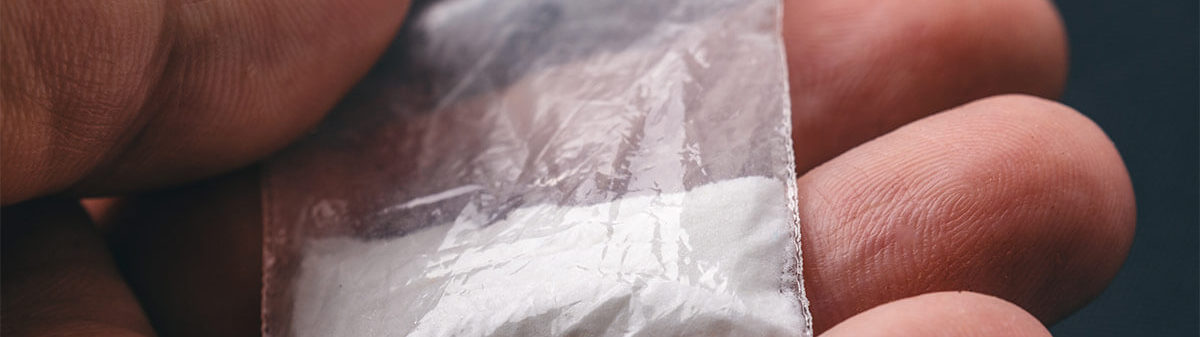 Small plastic bag of white powder drug