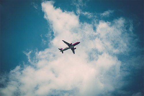 airplane flying through sky