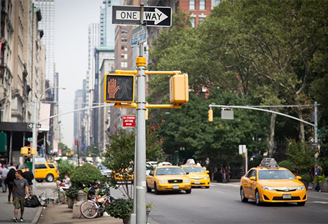 cabs driving down the road