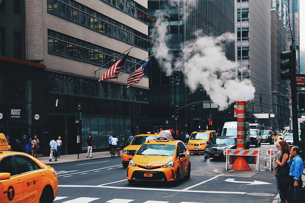 cabs driving down the street