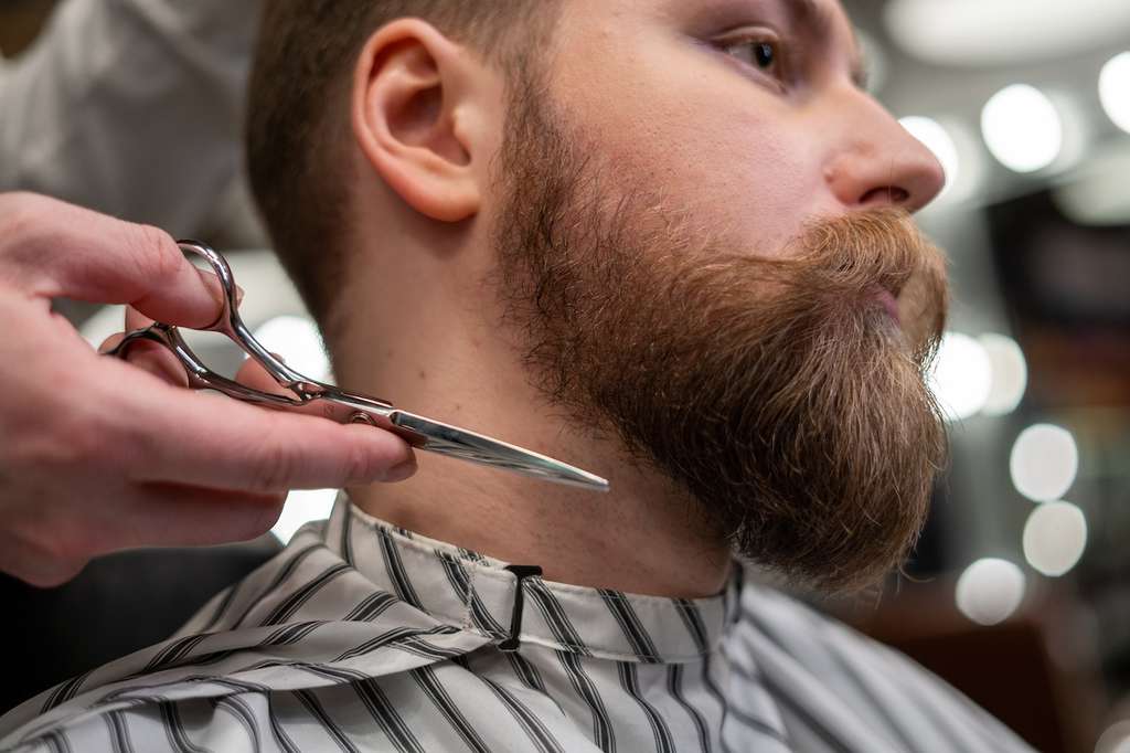 Cutting samples of a man’s facial hair