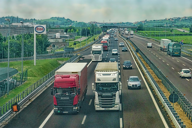 cars and trucks on the highway