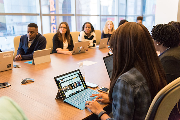 employees sitting around a table