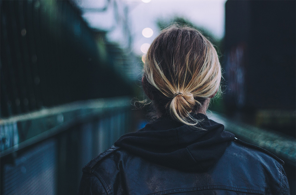 woman with blond hair in a bun