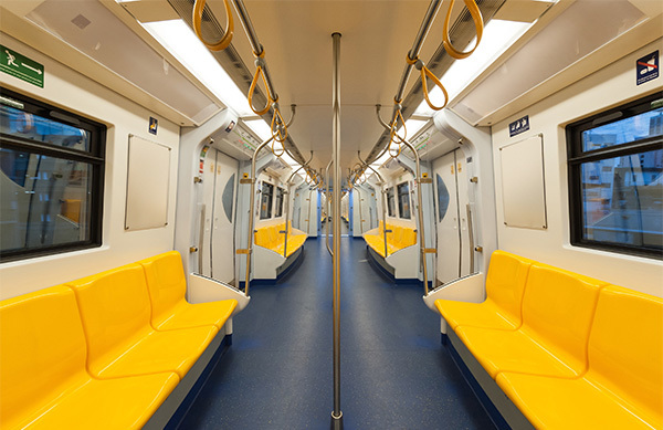 inside of train with yellow seats