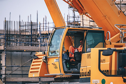 man operating construction truck