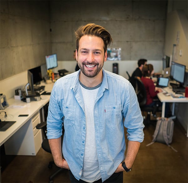 man smiling in office