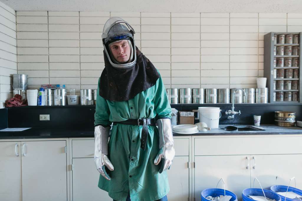 person wearing protective suit