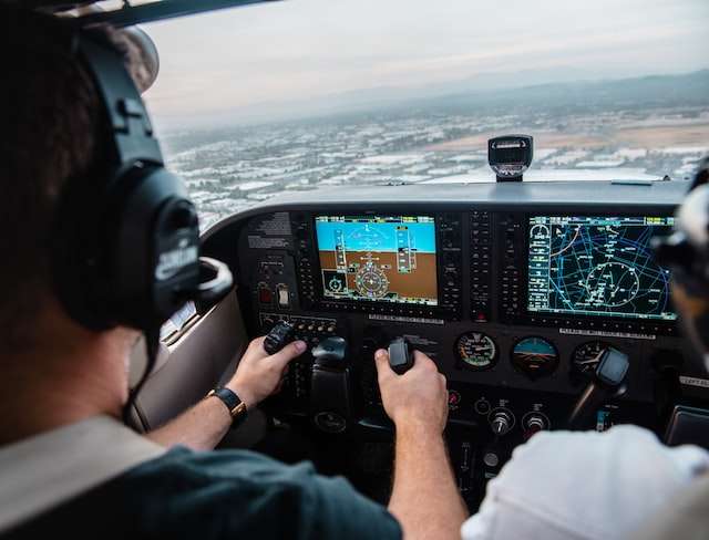 A pilot manning an airplane