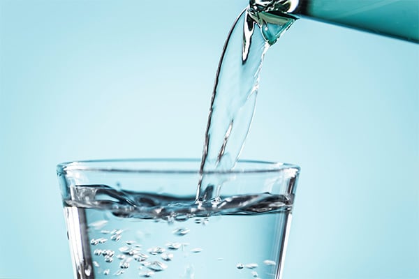 pouring a glass of water