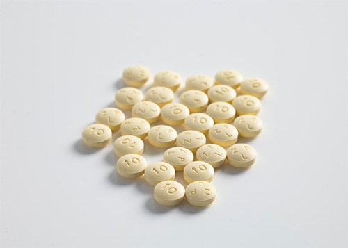 round yellow pills