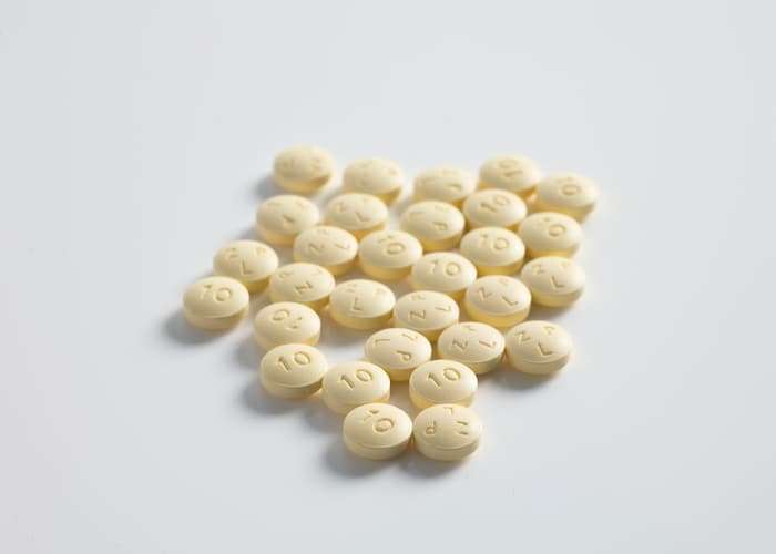 round yellow prescription pills