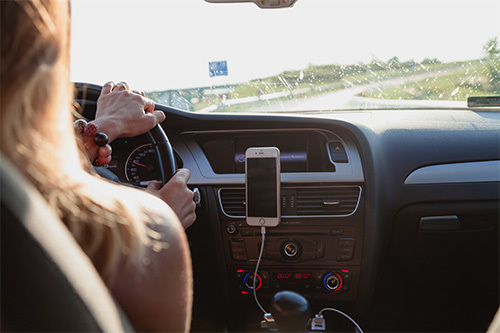 teenage girl driving car