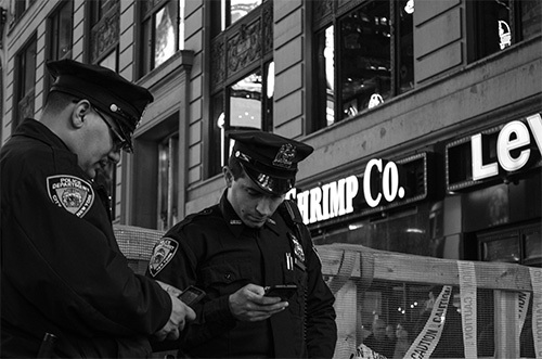 two cops standing outside