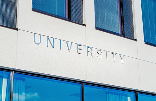 university sign on building