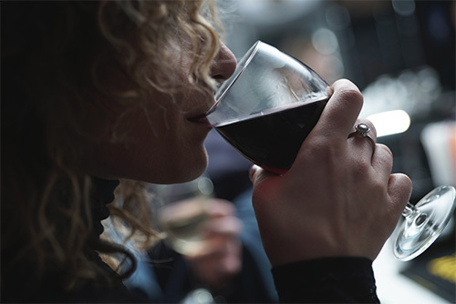 woman drinking red wine