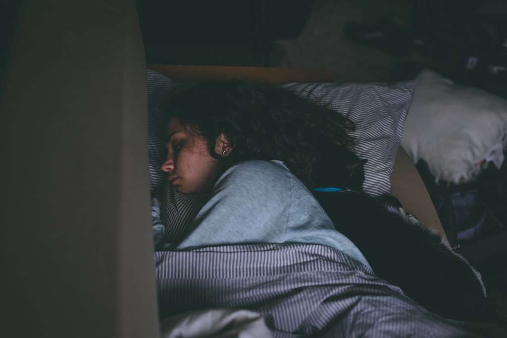 woman sleeping in bed