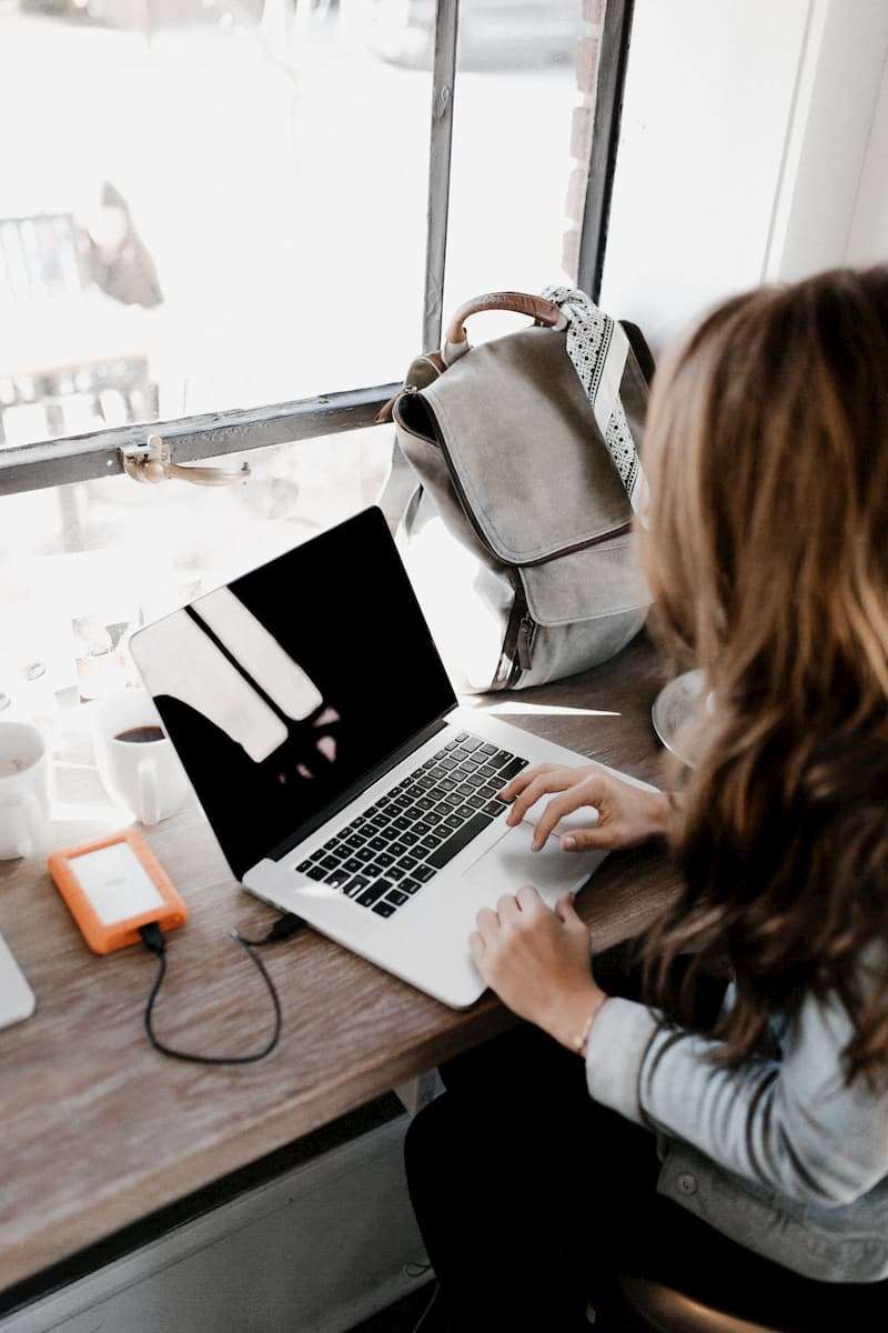 woman typing on computer