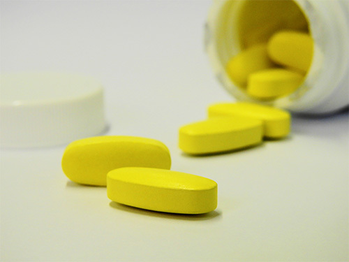 yellow tablet pills